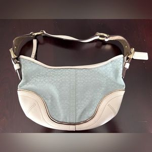 Light blue signature coach purse with cream leather